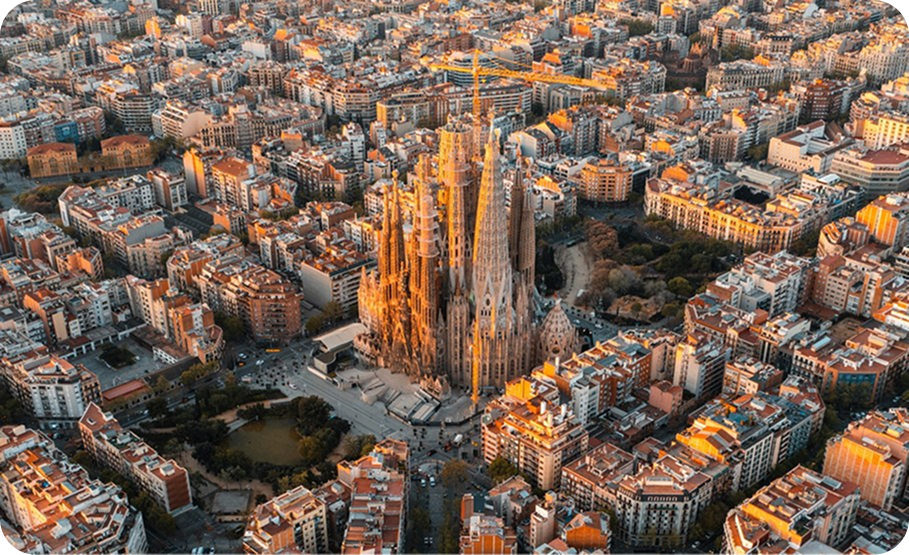 Aerial view of Barcelona cityscape with Sagrada Familia cathedral.