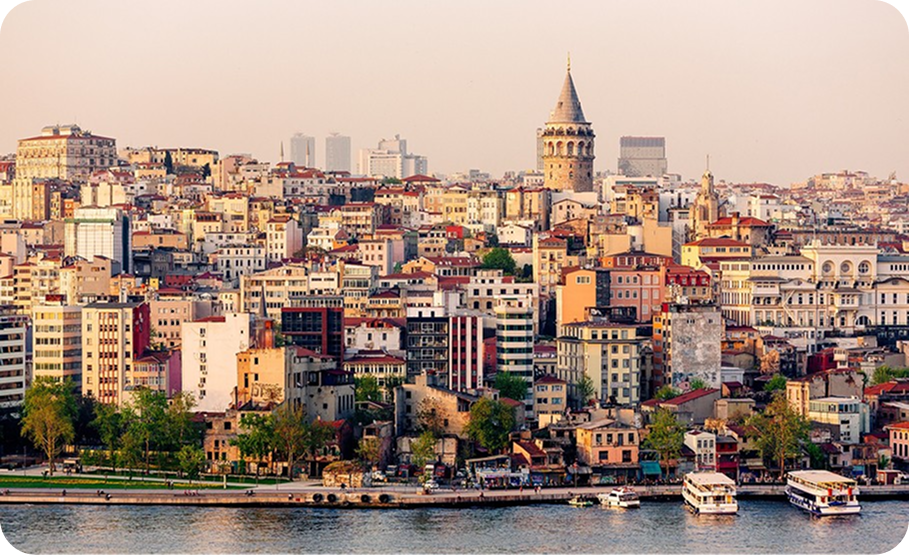 Istanbul skyline with a historic mosque and minarets at sunset.