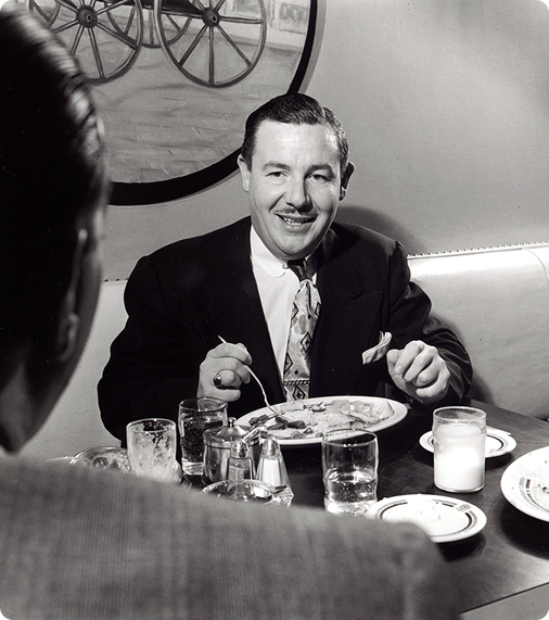 A man eating and talking